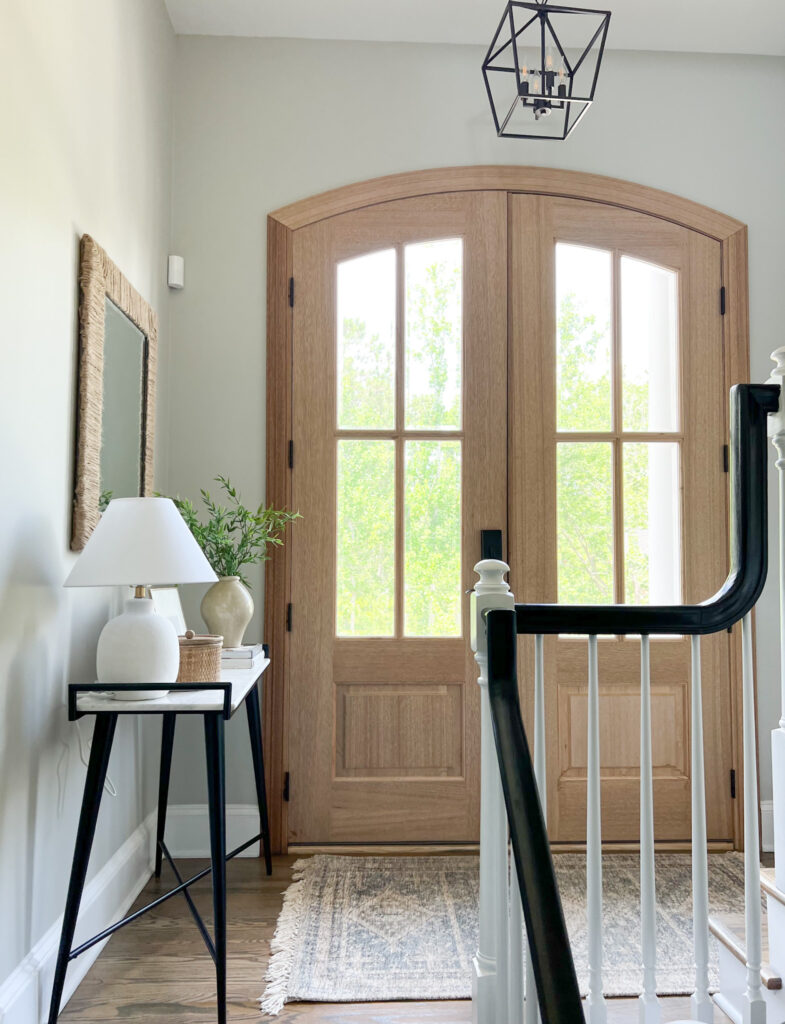 split foyer with double wood door