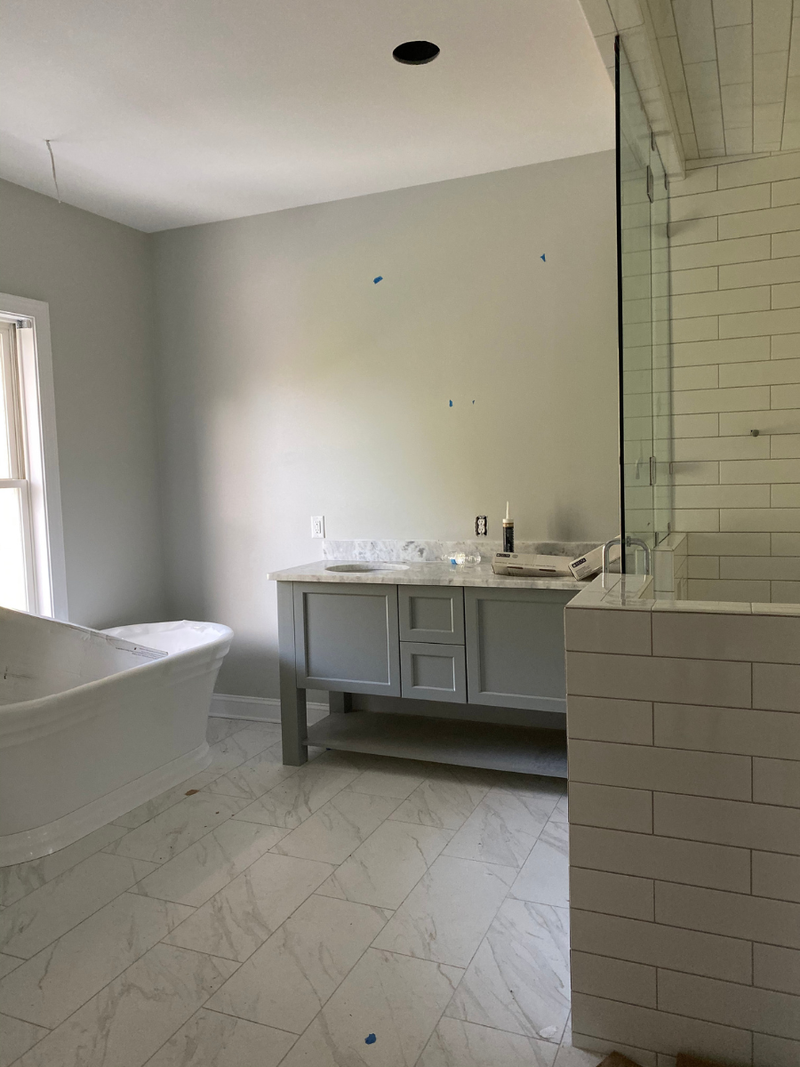 Marble look tile floor bathroom