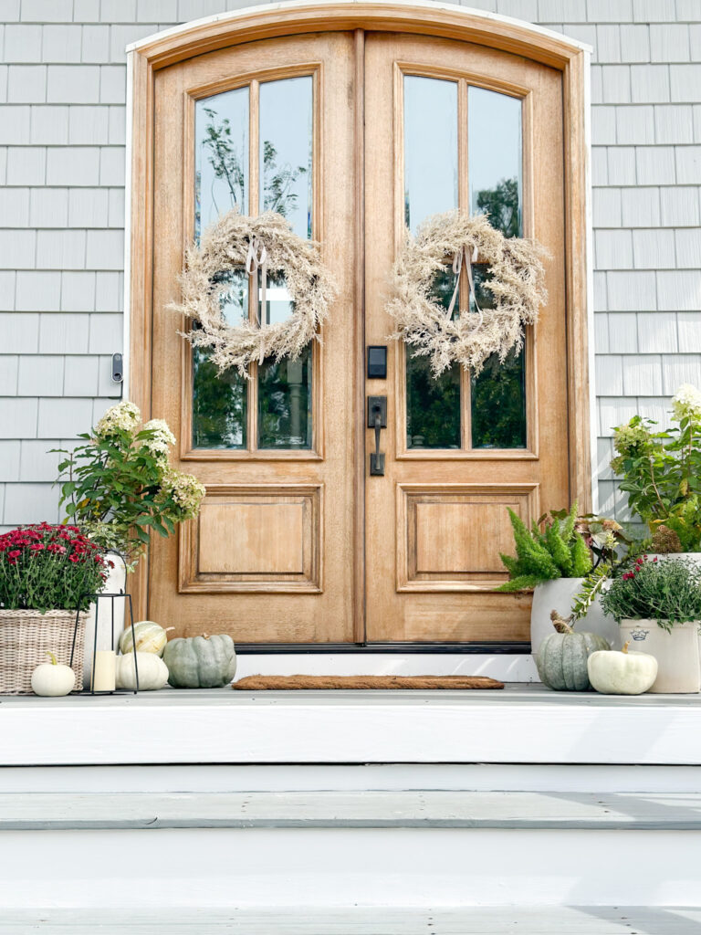 coastal fall porch with fall wreath