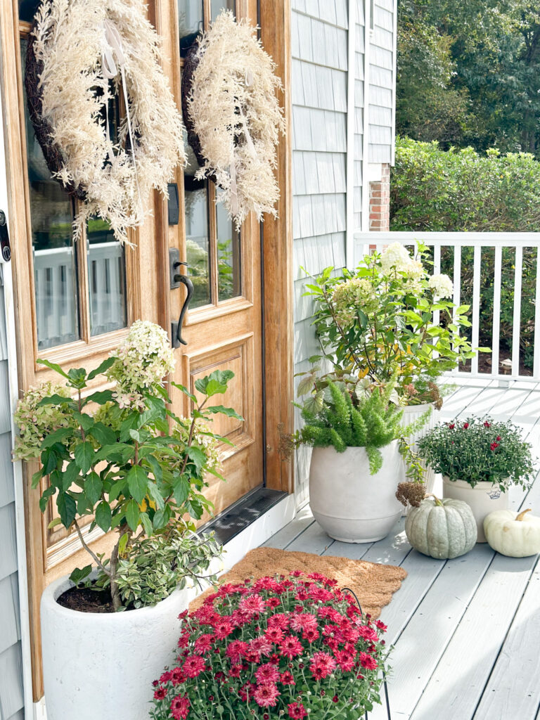 coastal cottage fall porch,  neutral fall porch decor