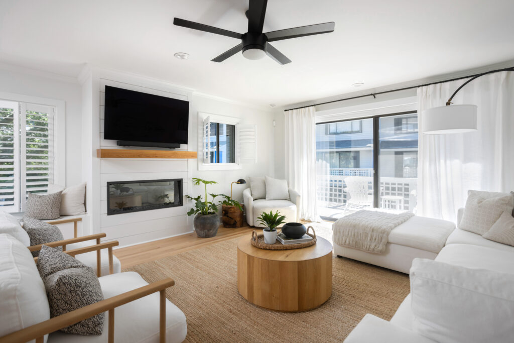 coastal modern white living room with wood tones