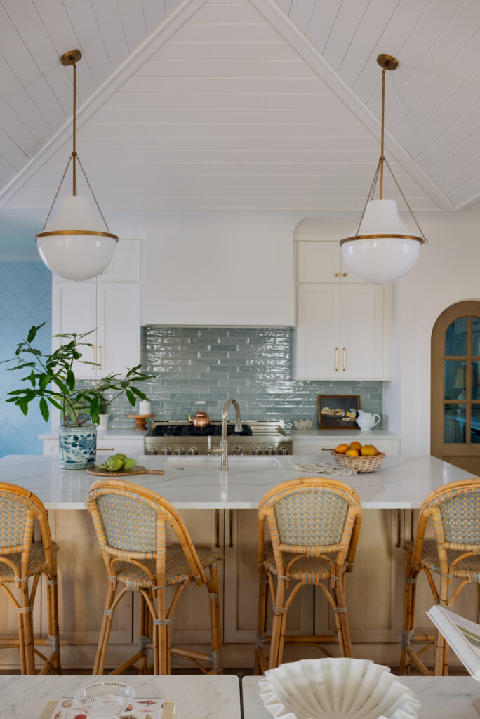 blue backsplash coastal kitchen with pendant lights